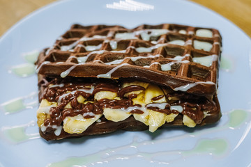 tasty Belgium waffle with organic sweets served for breakfast