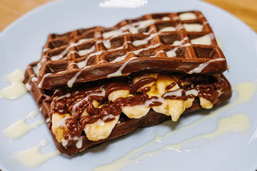tasty Belgium waffle with organic sweets served for breakfast