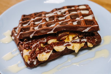 tasty Belgium waffle with organic sweets served for breakfast