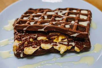 tasty Belgium waffle with organic sweets served for breakfast
