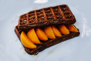 tasty Belgium waffle with organic sweets served for breakfast