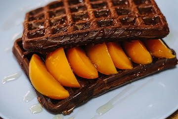tasty Belgium waffle with organic sweets served for breakfast