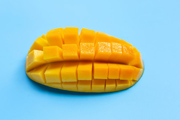 Tropical fruit, Mango  on blue background.