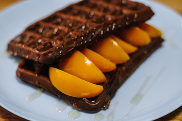 tasty Belgium waffle with organic sweets served for breakfast