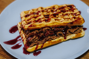 tasty Belgium waffle with organic sweets served for breakfast