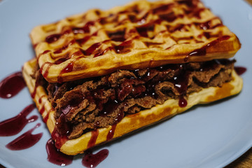 tasty Belgium waffle with organic sweets served for breakfast