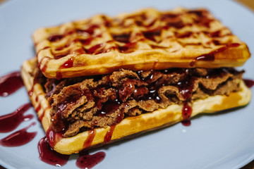 tasty Belgium waffle with organic sweets served for breakfast