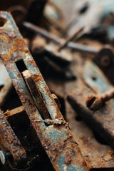 Scrap metal. Rusty screws, latches, curtain. Rust texture. Close-up. Macro. Corrosion of metal