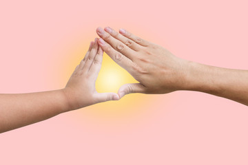 Young and old hands are triangles on isolated pink backgrounds.