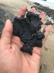 child playing with sand
