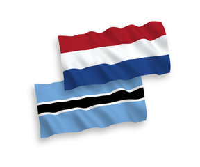 Flags of Botswana and Netherlands on a white background