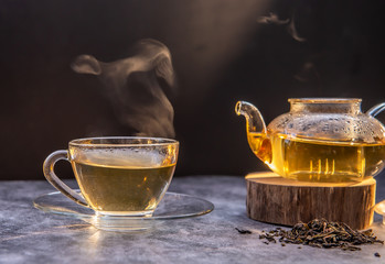 cup of tea with teapot