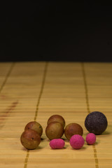 Carp fishing chod rig. Fishing rig for carps, boilie rig, on a piece of wood