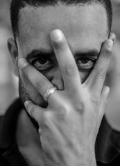 fine black and white portrait of a chprismatic egyptian guy from Alexandria