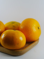 Four orange in white background