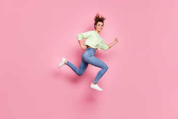 Full body profile side photo of cute pretty cheerful girl jump run after black friday discount wear sweater sneakers isolated over pastel color background