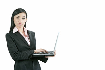 Businesswoman using laptop