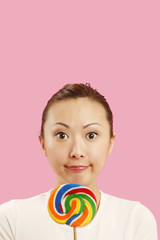 Woman with lollipop