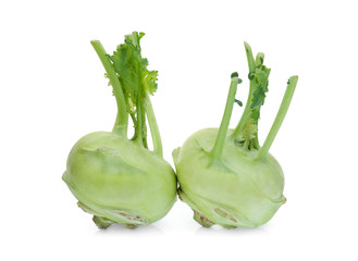 two whole kohlrabi isolated on white background