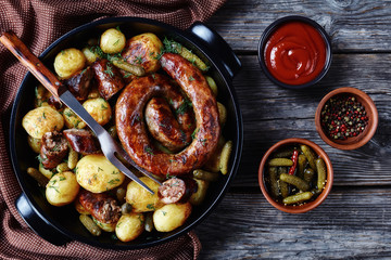 Summer dinner: roasted sausage and young potato