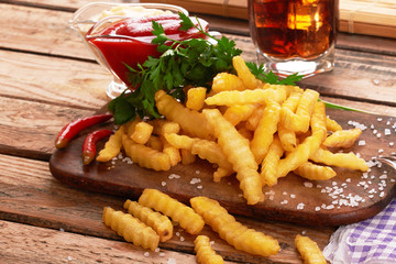 french fries on wooden table