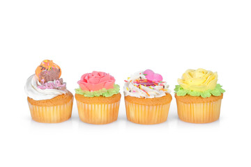 colorful of cupcakes isolated on white background