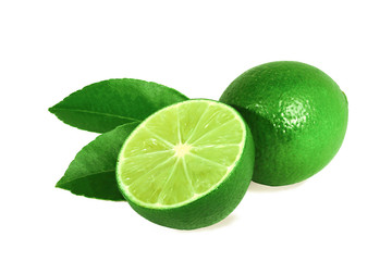 Fresh green lime, cut in half,  with leaves, sharp pictures Sour fruit with a beautiful shadow in nature Isolated on a white background
