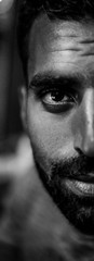 fine black and white portrait of a chprismatic egyptian guy from Alexandria