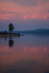 Early morning on the lake Turgoyak , Russia