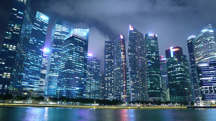Sigapore Downtown Skyline at Night With Office Skyscrapers