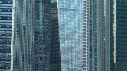 Exterior Glass Facade of Generic Modern Office Skyscraper Buildings in City