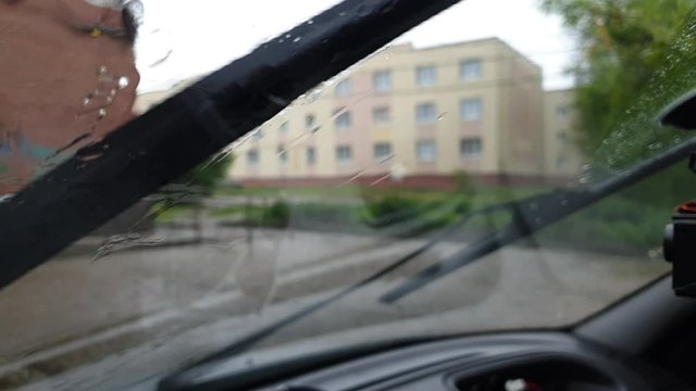raindrops on the car windshield, climate change, heavy downpours