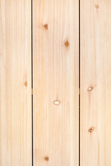 Naklejka premium vertical wooden background - unpainted wood panel from three vertical pine planks