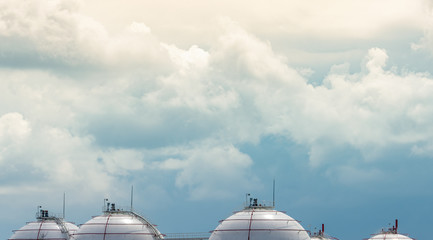 Industrial gas storage tank. LNG or liquefied natural gas storage tank. Spherical gas tank in petroleum refinery. Above-ground storage tank. Natural gas storage industry and global market consumption