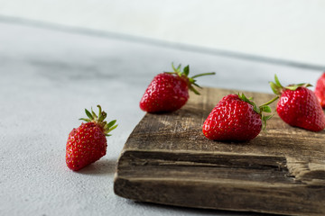 Fresh red aromatic wholesome summer berry. Strawberry. The concept of a healthy diet and agriculture.