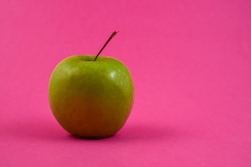 apple on purple background
