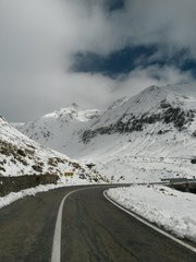 spectacular road crossing mountains in winter season