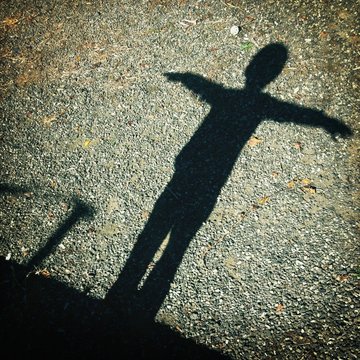 Boy Shadow Standing With Arms Out