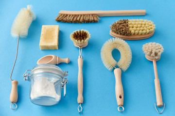 natural cleaning stuff, sustainability and eco living concept - different brushes and soda powder...