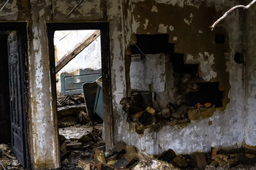 Fototapeta na wymiar Abandoned haunted house after fire