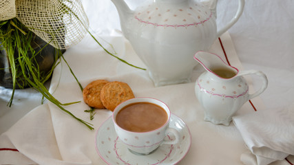 coffee with cookies on the table