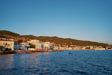 Fototapeta premium A sunsrise view of the buildings of the beautiful Greek Island.