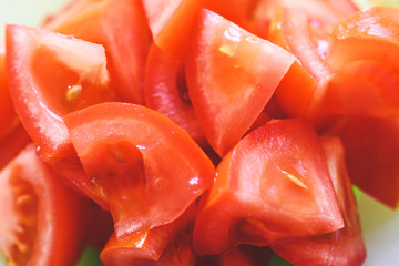 Pieces of red tomato close-up.