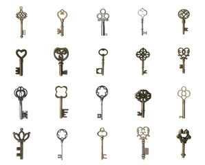 Set of different ornate keys on white background