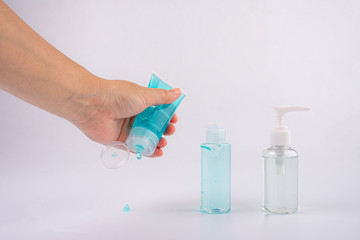 hand with alcohol gel or hand sanitizer pump bottle for washing hand in hospital or public area. 
