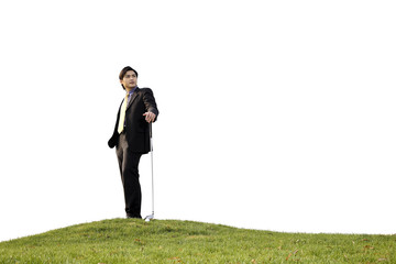 Businessman posing with golf club