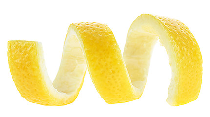 Spiral sliced lemon skin. Lemon twist or lemon peel isolated on a white background.