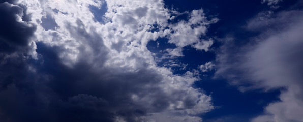 Rich and lovely clouds on a bright Sunny day in a blue sky