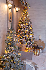 Christmas porch decorated in a New Year's style with a Christmas tree and garlands. Snowy Rozhdestvenskaya street.