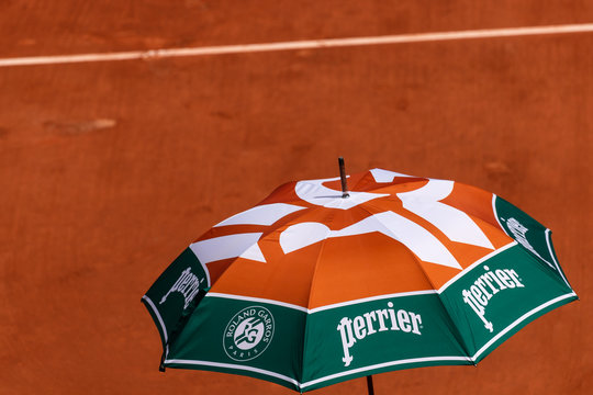 Paris, France,  an advertising umbrella is used to protect players from the sun heat during French Tennis Open